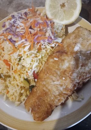 Una foto de Arroz con pescado 🐟