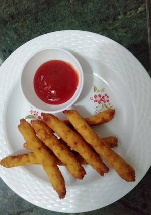 A picture of Poha flattened rice potato fingers.