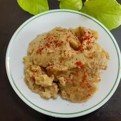 A picture of Mix flours Khichu (in Pressure cooker).