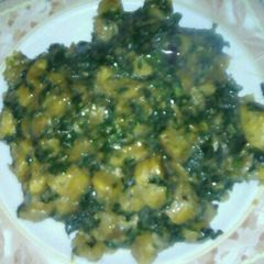 A picture of Unripe plantain and vegetables porridge.