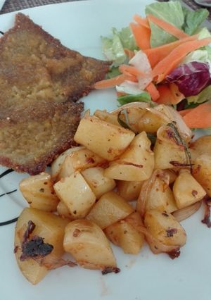 Una foto de Guarnición papas con pimentón