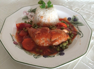 Una foto de Pollo arvejado