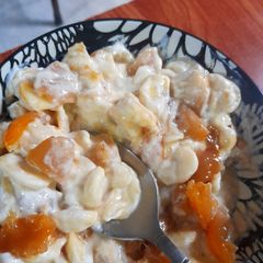 A picture of Banana plum delight with caramel sauce.