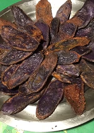 Une photo de Pommes de terre vitelotte aux épices façon chips