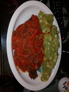 A picture of Fried fish served with mukimo.