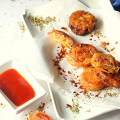 Margherita Fritters: Batter-fried Tomato & Mozzarella Rings A picture of Margherita Fritters: Batter-fried Tomato & Mozzarella Rings.