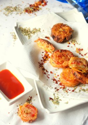 A picture of Margherita Fritters: Batter-fried Tomato & Mozzarella Rings.
