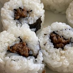 A picture of Beef sushi.