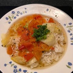 A picture of Tomato and Lettuce Zōsui (Japanese Rice Porridge).