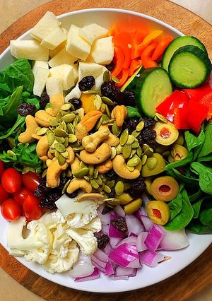 A picture of Vegan Buddha Bowl with Spicy Orange Ginger Vinaigrette.