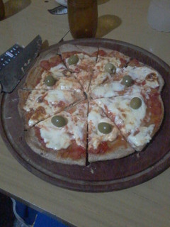Una foto de Pizza integral