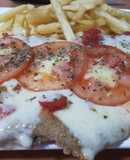 Milanesa a la napolitana con fritas