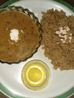 A picture of Dal makhani with lapsi.