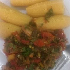 A picture of Boiled plantain and veggie sauce.