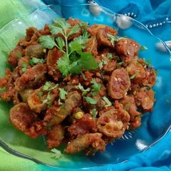 A picture of Stuffed Spiny gourd sabji in Gujarati style.