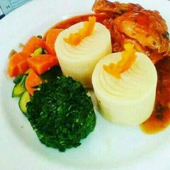 Mashed potatoes,stewed chicken and Sisibo with buttered Veges A picture of Mashed potatoes,stewed chicken and Sisibo with buttered Veges.