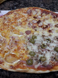 Una foto de Pizza capricho