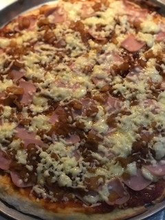 Una foto de Pizza Hawaiana de Piña
