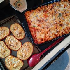 A picture of Spinach Rotini Bake with Meat Sauce & Homemade Garlic Toast.