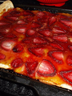 Una foto de Coca de fresas