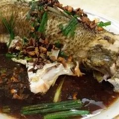 A picture of Steam Fish in Supreme Soy Sauce topped with Salted Black Daze.
