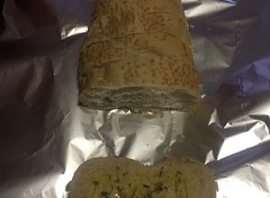 Una foto de Pan de ajo y parmesano