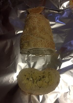 Una foto de Pan de ajo y parmesano