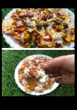 சீஸி நாசோஸ் பீட்சா(cheesy nachos pizza recipe in tamil) செய்முறை முக்கிய புகைப்படம்