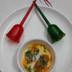A picture of Raw banana peanut kofta curry.