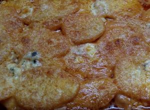 Una foto de Papas con crema rosada
