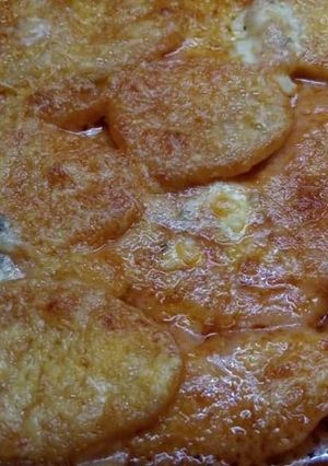 Una foto de Papas con crema rosada