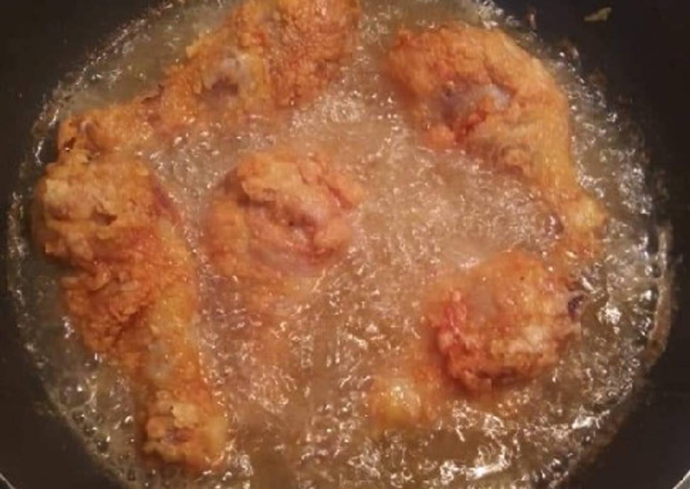 Pollo frito empanado