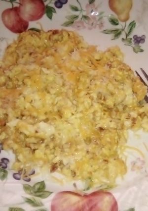 A picture of Fluffy cheese and bacon eggs.