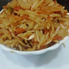 A picture of Jaggery and carrot rice.