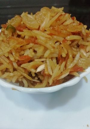 A picture of Jaggery and carrot rice.