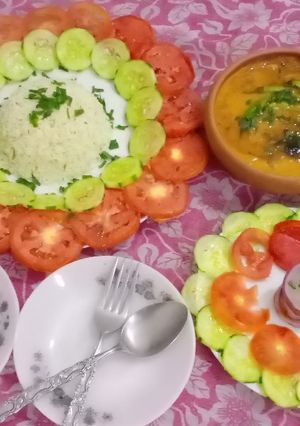 A picture of Yummy makkhan wali moong ki daal with zeera rice.