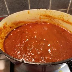 A picture of Rich tomato pasta sauce.