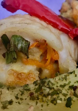 Una foto de FILET DE MERLUZA🐠🐟(relleno al horno)🐠🐟