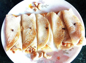 A picture of Patishapta with Coconut.