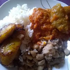 A picture of Rice and Beans with Beef Stew.