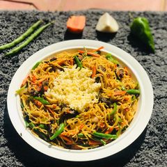 A picture of Stirfry veggies pasta with scrambled egg.