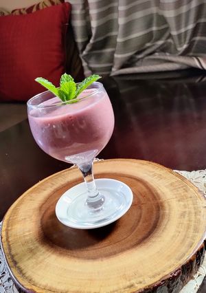 A picture of Pomegranate, Orange Lassi.