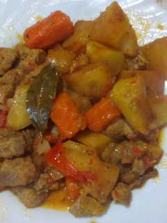 Una foto de Cerdo con patatas