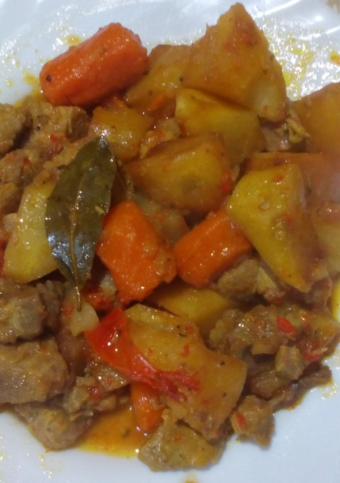 Una foto de Cerdo con patatas