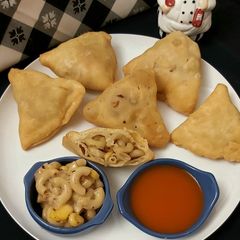 A picture of Pasta with Mayonnaise Stuffed Samosas.