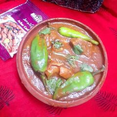 A picture of Chatpata achari gosht.