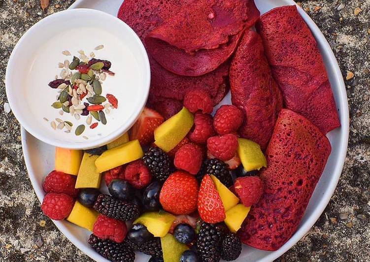 Beetroot pancakes with berries, mango with vegan yoghurt+seeds