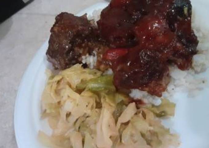 Bbq oxtails w rice in cabbage