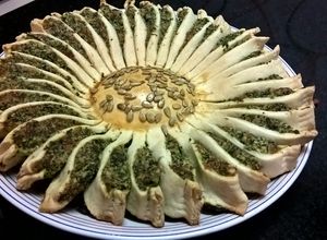 Una foto de Tarta sol con espinaca, ricota y parmesano