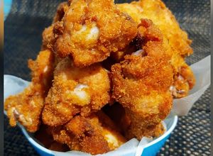Una foto de Alitas de Pollo fritas
